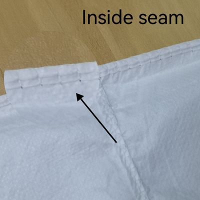 Μη υφασμένα εργασιακά ρούχα μιας χρήσης Unisex Αδιάβροχο ερευνητικό παλτό για το νοσοκομειακό χώρο εργασίας